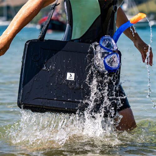 Protective case Peli Laptop Case used by a diver to protect his laptop from water.